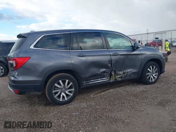 ✅ 2019 Honda Pilot EX-L • VIN: 5FNYF6H59KB022751 • Lot: 43499822. Listed on IAAI with 100,180 mi. Free auction sales archive from the USA and detailed vehicle history report at DreamBid. Image 13.