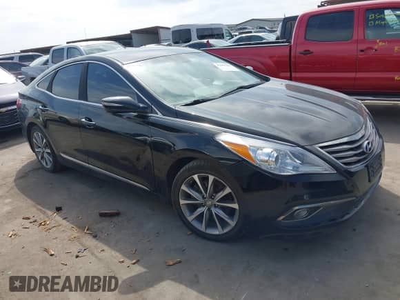 2015 Hyundai Azera Limited с VIN KMHFH4JG8FA435093, выставлен на аукционе IAAI как лот 41601706 с пробегом 142 820 миль миль и . История ставок и продаж доступна на DreamBid. Изображение 1.