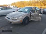 ✅ 1999 Mercury Sable LS • VIN: 1MEFM53SXXA647145 • Lot: 43602157. Listed on IAAI with 184,332 mi. Free auction sales archive from the USA and detailed vehicle history report at DreamBid. Image 2.