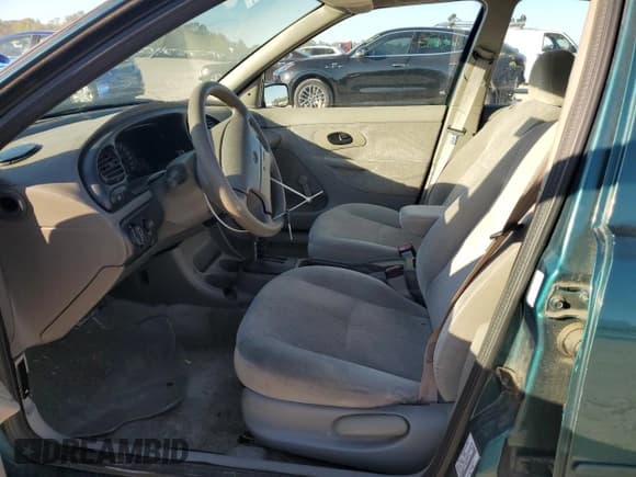 ✅ 1998 Ford Contour • VIN: 1FAFP65L2WK235594 • Лот: 81118614. Опубликован ранее на Copart с пробегом 62 140 миль. Бесплатный доступ к архиву аукционных продаж из США и подробный отчёт об истории автомобиля на DreamBid. Изображение 7.