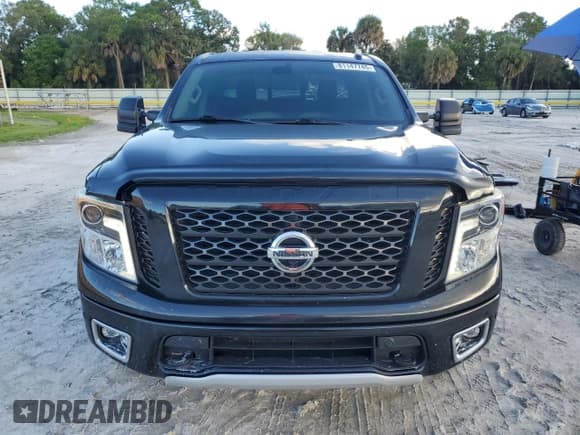 ✅ 2019 Nissan Titan Pro-4X • VIN: 1N6AA1E50KN523906 • Lot: 81147745. Wystawiony na Copart z przebiegiem 73 146 mil. Bezpłatny archiwum sprzedaży aukcyjnych z USA i szczegółowy raport historii pojazdu na DreamBid. Zdjęcie 5.