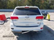 ✅ 2014 Jeep Grand Cherokee Summit • VIN: 1C4RJFJG9EC476126 • Lot: 43468707. Listed on IAAI with 143,755 mi. Free auction sales archive from the USA and detailed vehicle history report at DreamBid. Image 17.