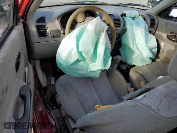 2000 Hyundai Accent with VIN KMHCG35G7YU033965, listed as a Copart auction lot 82433065 with 111,729 mi miles and Salvage title. Bid and sale history available at DreamBid. Image 8.