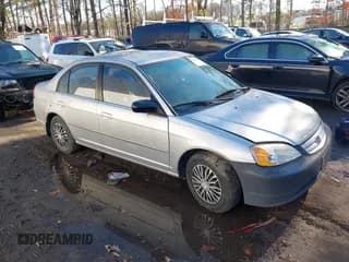 ✅ 2002 Honda Civic LX • VIN: 1HGES16542L034745 • Lot: 41214825. Listed on IAAI with 260,792 mi. Free auction sales archive from the USA and detailed vehicle history report at DreamBid. Image 1.