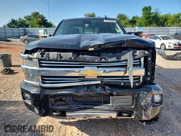 2017 Chevrolet Silverado 2500HD High Country с VIN 1GC1KXEG8HF191348, выставлен на аукционе Copart как лот 65356885 с пробегом 159 116 миль миль и Списание • Salvage title. История ставок и продаж доступна на DreamBid. Изображение 5.