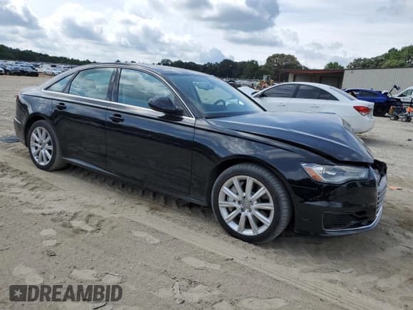 ✅ 2016 Audi A6 Premium • VIN: WAUCFAFC1GN129958 • Лот: 68568975. Опубликован ранее на Copart с пробегом 99 328 миль. Бесплатный доступ к архиву аукционных продаж из США и подробный отчёт об истории автомобиля на DreamBid. Изображение 4.