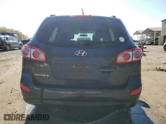 ✅ 2012 Hyundai Santa Fe GLS • VIN: 5XYZG4AG1CG154401 • Lot: 82873394. Listed on Copart with 267,184 mi. Free auction sales archive from the USA and detailed vehicle history report at DreamBid. Image 6.