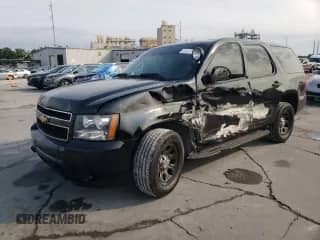 2013 Chevrolet Tahoe Commercial с VIN 1GNLC2E00DR304026, выставлен на аукционе Copart как лот 57041135 с пробегом 125 087 миль миль и Списание • Salvage title. История ставок и продаж доступна на DreamBid. Изображение 1.