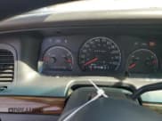 ✅ 2003 Ford Crown Victoria Standard • VIN: 2FAFP73WX3X140146 • Lot: 76968034. Listed on Copart with 27,760 mi. Free auction sales archive from the USA and detailed vehicle history report at DreamBid. Image 9.