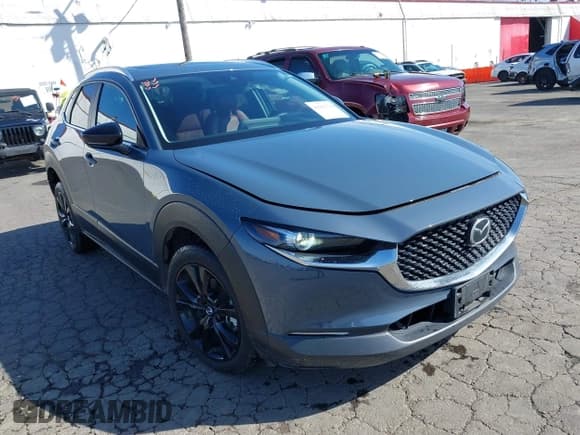✅ 2023 Mazda CX-30 S Carbon Edition • VIN: 3MVDMBCM1PM557862 • Lot: 41966734. Listed on IAAI with 36,757 mi. Free auction sales archive from the USA and detailed vehicle history report at DreamBid. Image 1.