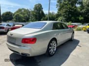 ✅ 2014 Bentley Flying Spur • VIN: SCBEC9ZA0EC090997 • Lot: 66647375. Listed on Copart with 46,000 mi. Free auction sales archive from the USA and detailed vehicle history report at DreamBid. Image 4.