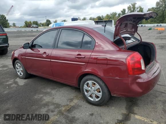 2010 Hyundai Accent GLS z VIN KMHCN4AC9AU423907, wystawiony jako Copart lot #85865405 z przebiegiem 161 041 mil mil oraz Szkoda całkowita • Salvage title. Historia ofert i sprzedaży dostępna na DreamBid. Obrazek 2.