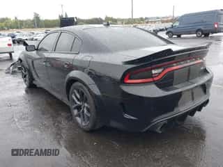 2019 Dodge Charger R/T with VIN 2C3CDXCT3KH634891, listed as a IAAI auction lot 43346308 with 64,501 mi miles and . Bid and sale history available at DreamBid. Image 3.