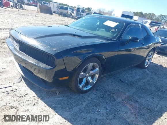 ✅ 2014 Dodge Challenger SXT • VIN: 2C3CDYAG1EH229824 • Lot: 41749410. Listed on IAAI with 103,079 mi. Free auction sales archive from the USA and detailed vehicle history report at DreamBid. Image 18.