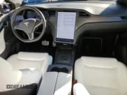 ✅ 2021 Tesla Model X Performance • VIN: 5YJXCBE44MF324718 • Lot: 81096074. Listed on Copart with 37,411 mi. Free auction sales archive from the USA and detailed vehicle history report at DreamBid. Image 8.