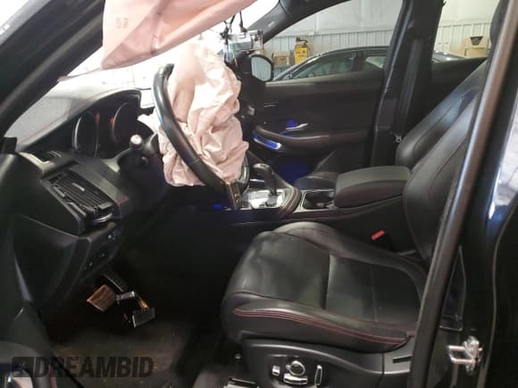 ✅ 2018 Jaguar E-Pace First Edition • VIN: SADFL2FX1J1Z03632 • Lot: 69793624. Wystawiony na Copart z przebiegiem 74 731 mil. Bezpłatny archiwum sprzedaży aukcyjnych z USA i szczegółowy raport historii pojazdu na DreamBid. Zdjęcie 7.