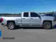 2014 Chevrolet Silverado 1500 LT z VIN 1GCRCREH9EZ321345, wystawiony jako IAAI lot #43542809 z przebiegiem 140 258 mil mil oraz . Historia ofert i sprzedaży dostępna na DreamBid. Obrazek 13.