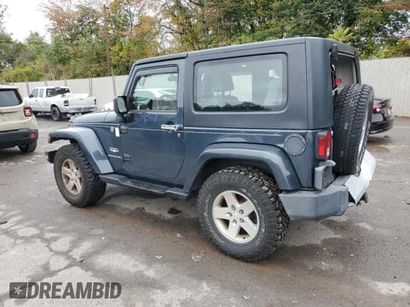 ✅ 2008 Jeep Wrangler Sahara • VIN: 1J8FA54128L521036 • Lot: 86328185. Listed on Copart with 101,540 mi. Free auction sales archive from the USA and detailed vehicle history report at DreamBid. Image 2.