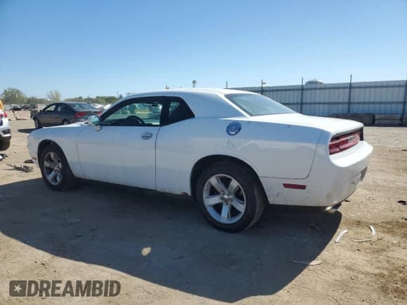 ✅ 2013 Dodge Challenger SXT • VIN: 2C3CDYAGXDH646082 • Lot: 73335194. Wystawiony na Copart z przebiegiem 219 508 mil. Bezpłatny archiwum sprzedaży aukcyjnych z USA i szczegółowy raport historii pojazdu na DreamBid. Zdjęcie 2.