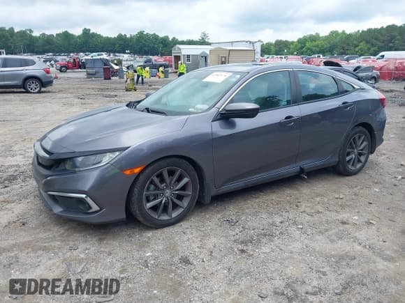 ✅ 2020 Honda Civic EX-L • VIN: 19XFC1F71LE010141 • Lot: 42502174. Listed on IAAI with 60,000 mi. Free auction sales archive from the USA and detailed vehicle history report at DreamBid. Image 17.