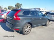 ✅ 2014 Volvo XC60 3.2L • VIN: YV4952DL5E2521300 • Lot: 43582534. Listed on IAAI with 58,190 mi. Free auction sales archive from the USA and detailed vehicle history report at DreamBid. Image 4.
