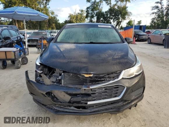 ✅ 2018 Chevrolet Cruze LS • VIN: 1G1BB5SM7J7203839 • Lot: 84742265. Listed on Copart with 87,543 mi. Free auction sales archive from the USA and detailed vehicle history report at DreamBid. Image 5.