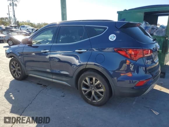 ✅ 2017 Hyundai Santa Fe Ultimate • VIN: 5XYZWDLA0HG440405 • Lot: 87273505. Listed on Copart with 127,272 mi. Free auction sales archive from the USA and detailed vehicle history report at DreamBid. Image 2.