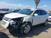 2012 Chevrolet Traverse LTZ z VIN 1GNKRLED2CJ184102, wystawiony jako IAAI lot #43306369 z przebiegiem 156 274 mil mil oraz . Historia ofert i sprzedaży dostępna na DreamBid. Obrazek 2.