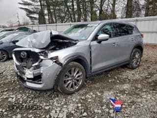 ✅ 2020 Mazda CX-5 Grand Touring • VIN: JM3KFBDM1L0824990 • Lot: 94034265. Listed on Copart with 110,454 mi. Free auction sales archive from the USA and detailed vehicle history report at DreamBid. Image 1.