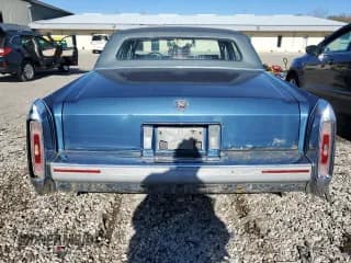 ✅ 1992 Cadillac Brougham • VIN: 1G6DW54E7NR707492 • Lot: 79950214. Wystawiony na Copart z przebiegiem 263 624 mil. Bezpłatny archiwum sprzedaży aukcyjnych z USA i szczegółowy raport historii pojazdu na DreamBid. Zdjęcie 6.