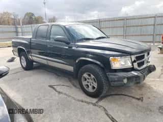 2008 Dodge Dakota SLT с VIN 1D7HW48KX8S594178, выставлен на аукционе Copart как лот 77591894 с пробегом 191 262 миль миль и Списание • Salvage title. История ставок и продаж доступна на DreamBid. Изображение 4.