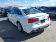 ✅ 2014 Audi A6 Prestige • VIN: WAUHMAFC8EN115466 • Лот: 43662078. Опубликован ранее на IAAI с пробегом 134 603 миль. Бесплатный доступ к архиву аукционных продаж из США и подробный отчёт об истории автомобиля на DreamBid. Изображение 3.