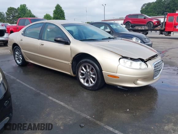 ✅ 1999 Chrysler LHS • VIN: 2C3HC56G5XH188438 • Lot: 42414384. Listed on IAAI with 182,077 mi. Free auction sales archive from the USA and detailed vehicle history report at DreamBid. Image 1.
