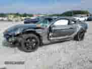 2022 Ford Mustang EcoBoost z VIN 1FA6P8TH9N5133197, wystawiony jako Copart lot #69819205 z przebiegiem 34 497 mil mil oraz Szkoda całkowita • Salvage title. Historia ofert i sprzedaży dostępna na DreamBid. Obrazek 1.