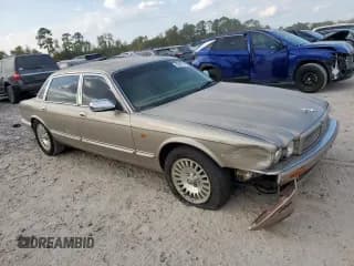 ✅ 1996 Jaguar XJ • VIN: SAJMX6345TC785912 • Lot: 93426155. Listed on Copart with 126,682 mi. Free auction sales archive from the USA and detailed vehicle history report at DreamBid. Image 4.