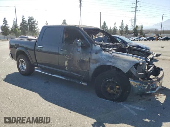 ✅ 2015 Ram 1500 Laramie • VIN: 1C6RR6NM9FS623410 • Lot: 61680915. Wystawiony na Copart z przebiegiem Nie podano. Bezpłatny archiwum sprzedaży aukcyjnych z USA i szczegółowy raport historii pojazdu na DreamBid. Zdjęcie 4.