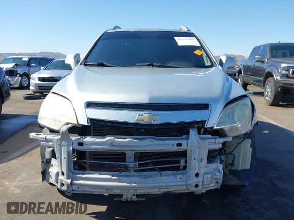 ✅ 2013 Chevrolet Captiva Sport LT • VIN: 3GNAL3EK5DS589575 • Lot: 42225395. Wystawiony na IAAI z przebiegiem 134 873 mil. Bezpłatny archiwum sprzedaży aukcyjnych z USA i szczegółowy raport historii pojazdu na DreamBid. Zdjęcie 6.