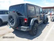 ✅ 2023 Jeep Wrangler • VIN: 1C4JJXN65PW628974 • Lot: 42867075. Wystawiony na IAAI z przebiegiem 62 357 mil. Bezpłatny archiwum sprzedaży aukcyjnych z USA i szczegółowy raport historii pojazdu na DreamBid. Zdjęcie 4.
