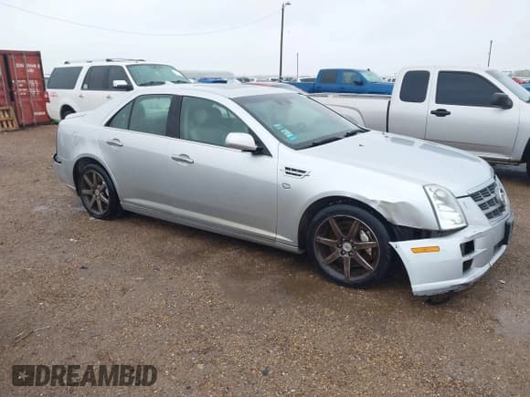 ✅ 2010 Cadillac STS AWD • VIN: 1G6DU6EV4A0114410 • Лот: 41301240. Опубликован ранее на IAAI с пробегом 120 023 миль. Бесплатный доступ к архиву аукционных продаж из США и подробный отчёт об истории автомобиля на DreamBid. Изображение 1.