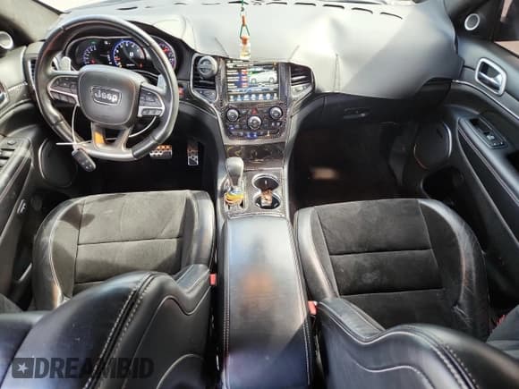 ✅ 2017 Jeep Grand Cherokee • VIN: NCS108376 • Lot: 57158405. Listed on Copart with 101,442 mi. Free auction sales archive from the USA and detailed vehicle history report at DreamBid. Image 8.