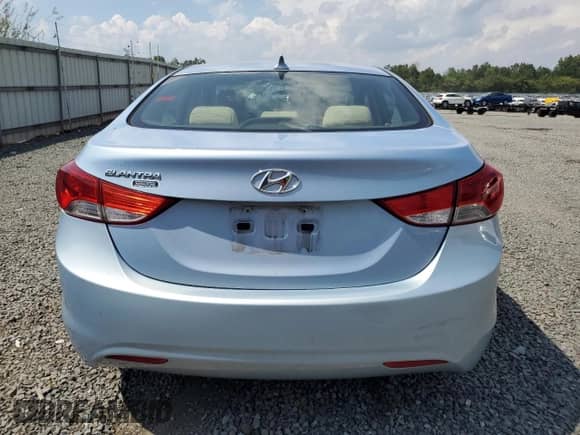 2013 Hyundai Elantra GLS z VIN KMHDH4AE4DU604351, wystawiony jako Copart lot #66271885 z przebiegiem 157 792 mil mil oraz Szkoda całkowita • Salvage title. Historia ofert i sprzedaży dostępna na DreamBid. Obrazek 6.