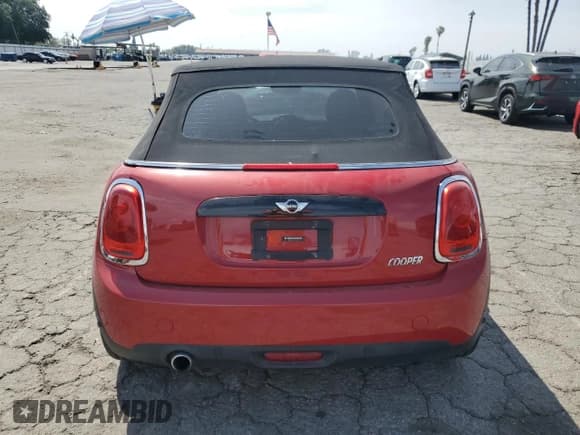 ✅ 2016 MINI Convertible • VIN: WMWWG5C54G3C19062 • Lot: 53077555. Wystawiony na Copart z przebiegiem 66 686 mil. Bezpłatny archiwum sprzedaży aukcyjnych z USA i szczegółowy raport historii pojazdu na DreamBid. Zdjęcie 6.