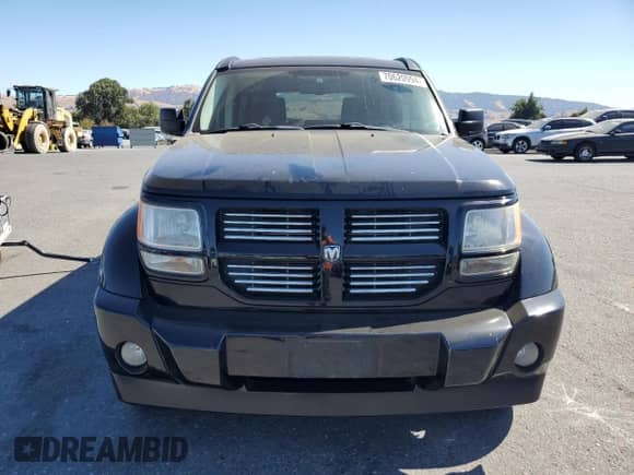 2007 Dodge Nitro R/T z VIN 1D8GT58677W627976, wystawiony jako Copart lot #70620994 z przebiegiem 146 750 mil mil oraz Szkoda całkowita • Salvage title. Historia ofert i sprzedaży dostępna na DreamBid. Obrazek 5.