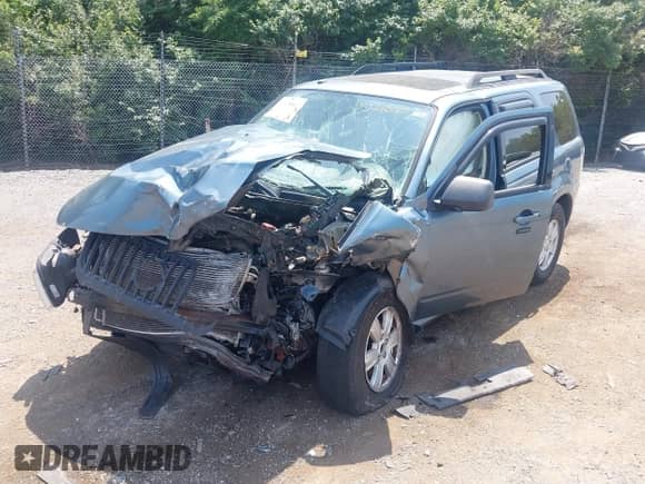 2010 Mercury Mariner with VIN 4M2CN9BG3AKJ28830, listed as a IAAI auction lot 42328802 with 116,650 mi miles and . Bid and sale history available at DreamBid. Image 6.