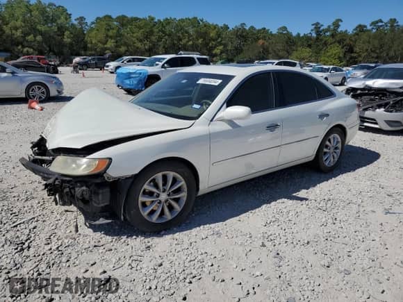 2006 Hyundai Azera SE с VIN KMHFC46F76A112099, выставлен на аукционе Copart как лот 76604094 с пробегом Не указан миль и Списание • Salvage title. История ставок и продаж доступна на DreamBid. Изображение 1.
