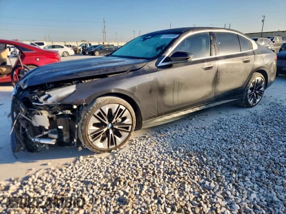 ✅ 2024 BMW i5 eDrive40 • VIN: WBY33FK05RCR49669 • Lot: 92306995. Listed on Copart with 16,444 mi. Free auction sales archive from the USA and detailed vehicle history report at DreamBid. Image 1.