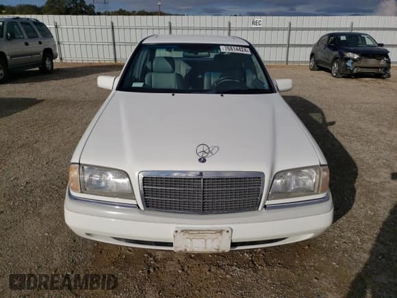 ✅ 1995 Mercedes-Benz C 2.8L • VIN: WDBHA28E1SF151911 • Лот: 76814424. Опубликован ранее на Copart с пробегом 128 184 миль. Бесплатный доступ к архиву аукционных продаж из США и подробный отчёт об истории автомобиля на DreamBid. Изображение 5.