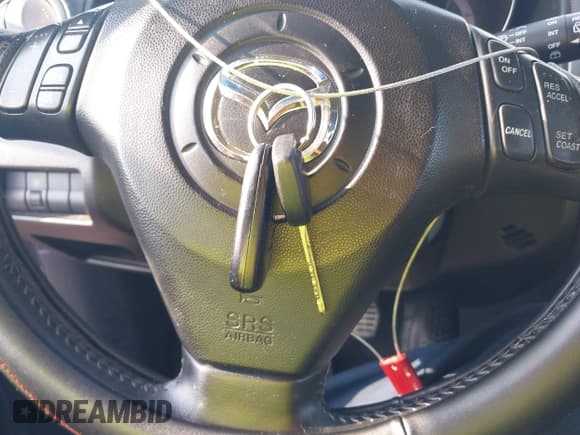 ✅ 2005 Mazda 3 s • VIN: JM1BK143951255390 • Lot: 42851705. Listed on IAAI with 209,770 mi. Free auction sales archive from the USA and detailed vehicle history report at DreamBid. Image 11.