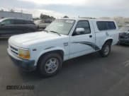 ✅ 1995 Dodge Dakota • VIN: 1B7FL26X7SW922718 • Lot: 92406245. Listed on Copart with 159,594 mi. Free auction sales archive from the USA and detailed vehicle history report at DreamBid. Image 1.