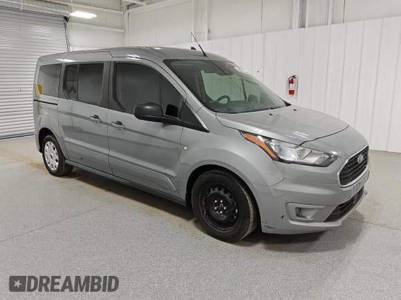 ✅ 2022 Ford Transit Connect XLT • VIN: NM0GE9F2XN1510366 • Lot: 82783464. Listed on Copart with 118,241 mi. Free auction sales archive from the USA and detailed vehicle history report at DreamBid. Image 4.